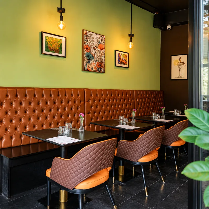 Dining seating and artwork at La Vitrine