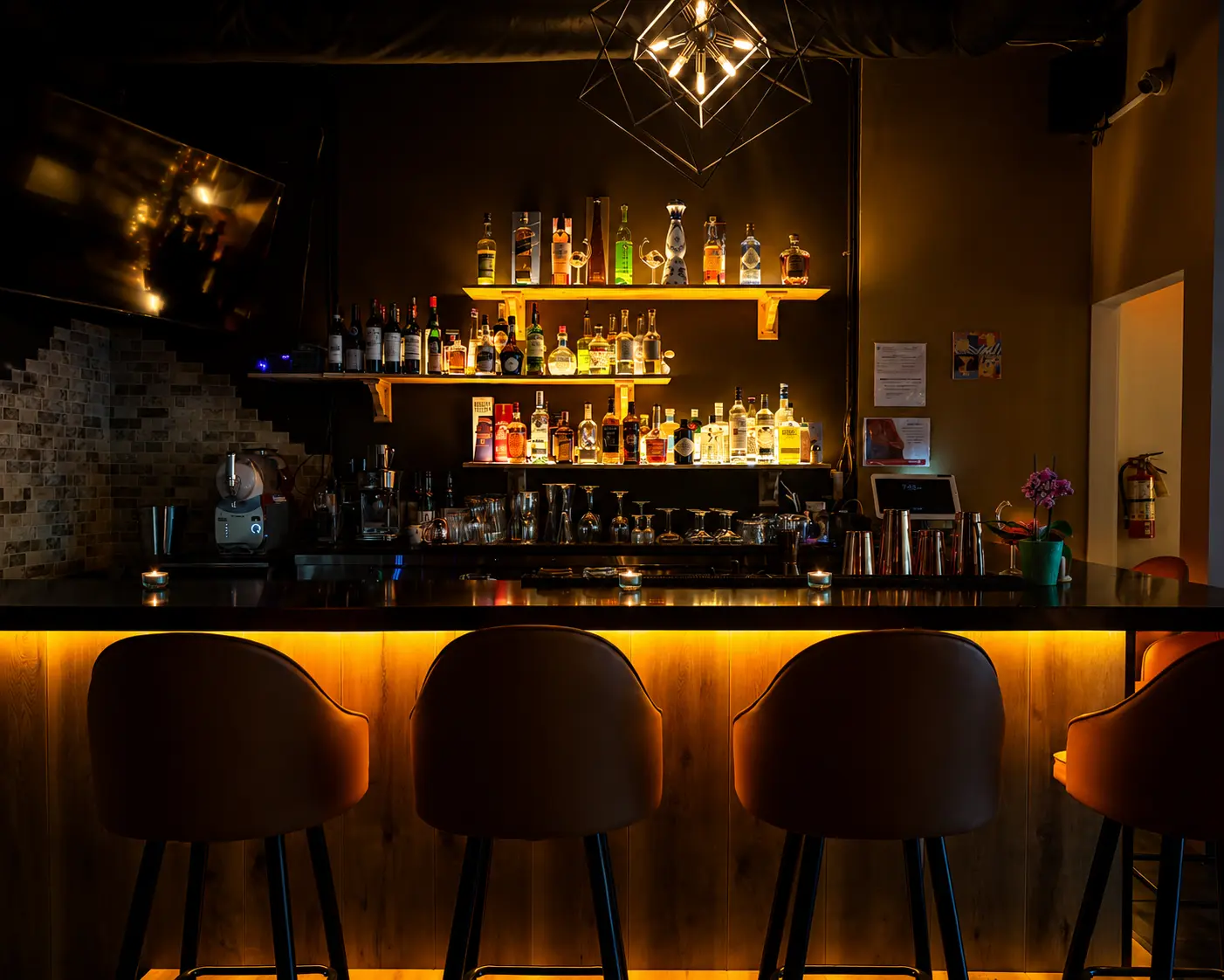 La Vitrine bar interior with warm amber lighting